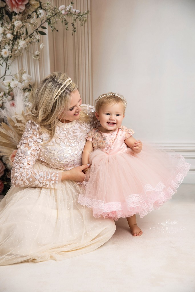 mother daughter photos nj, featuring cream and pink set against a floral backdrop