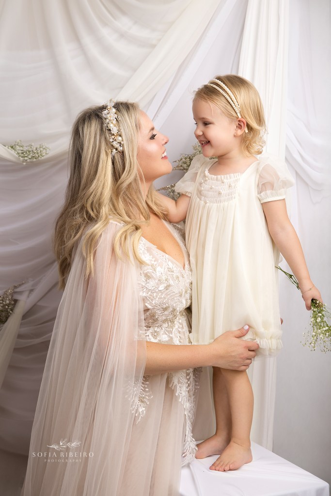 mother and daughter photos nj capture the sweet love between mom and her little girl set against soft creams