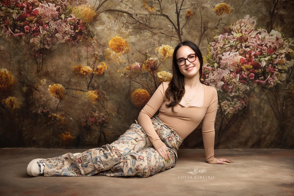 a casual pose showing the more light hearted side of a teenager's personality in muted florals