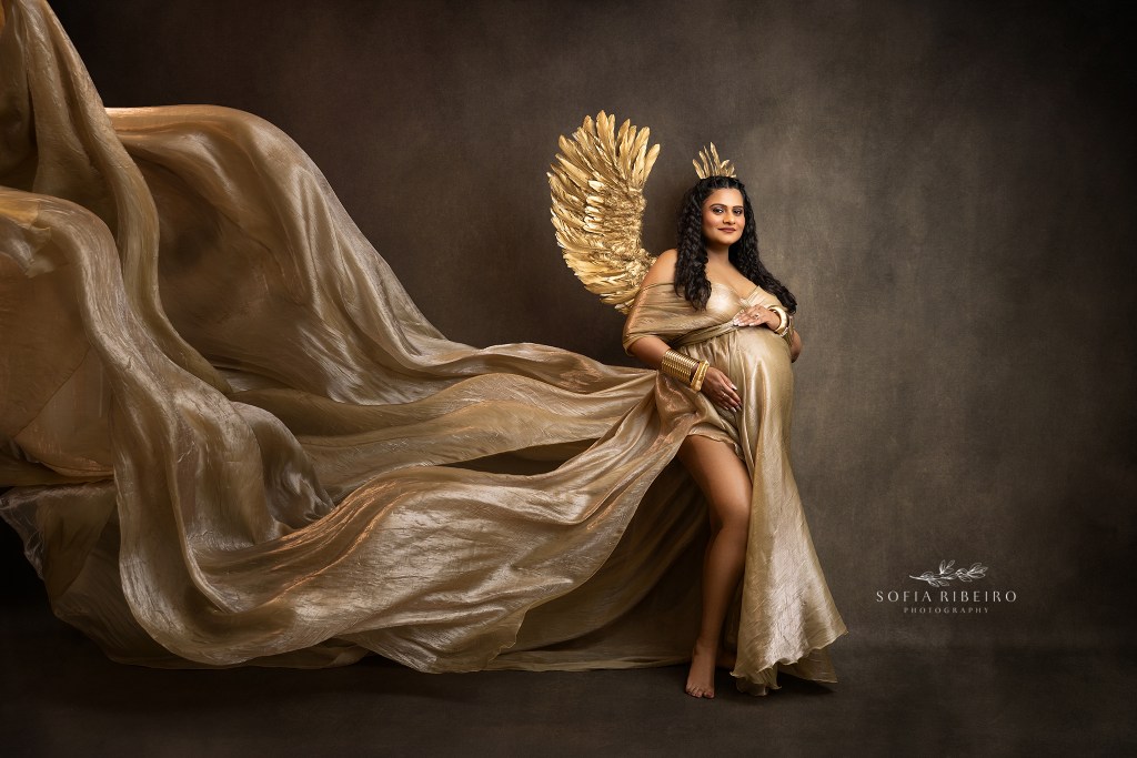 flowing golden fabrics capture G's baby bump during her maternity session