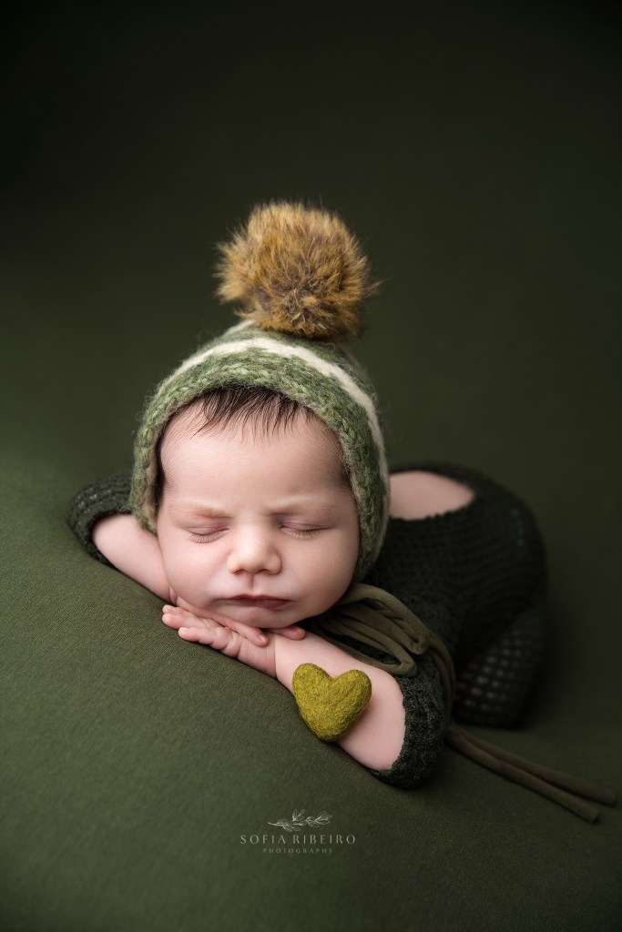nj newborn photographer captures a perfectly posed baby boy in olive green