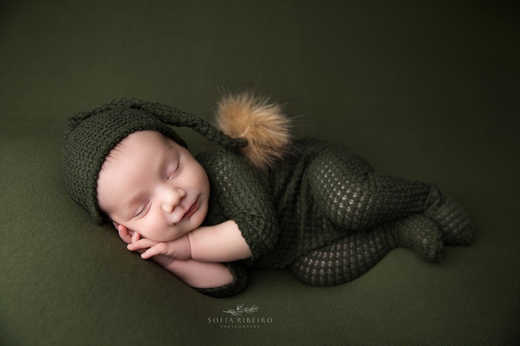 nj newborn photographer captures a perfectly posed baby boy in olive green