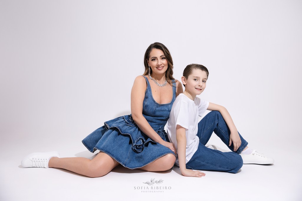 a mom and me photo session with mom and son in matching denim