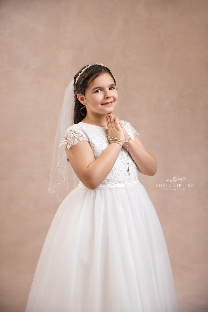 celebrating a young girls first holy communion with in studio portraits in nj