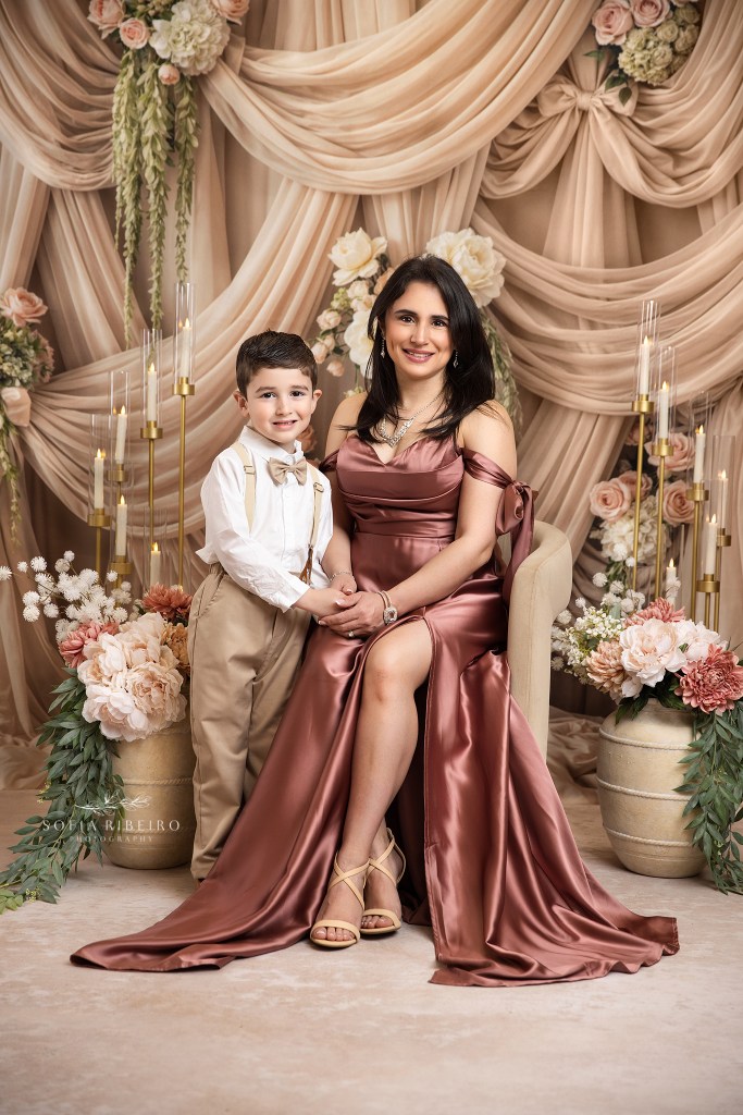 mother and son smile together for mom and me photos in studio in nj