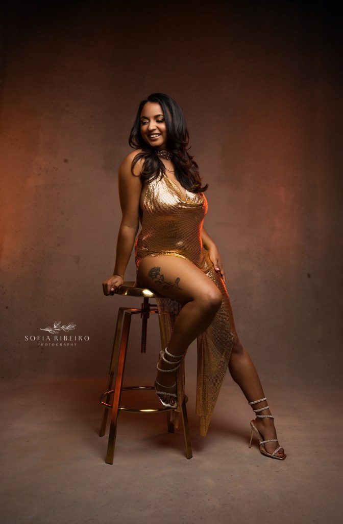 nj glamour photographer captures woman in a glittering gold metal dress