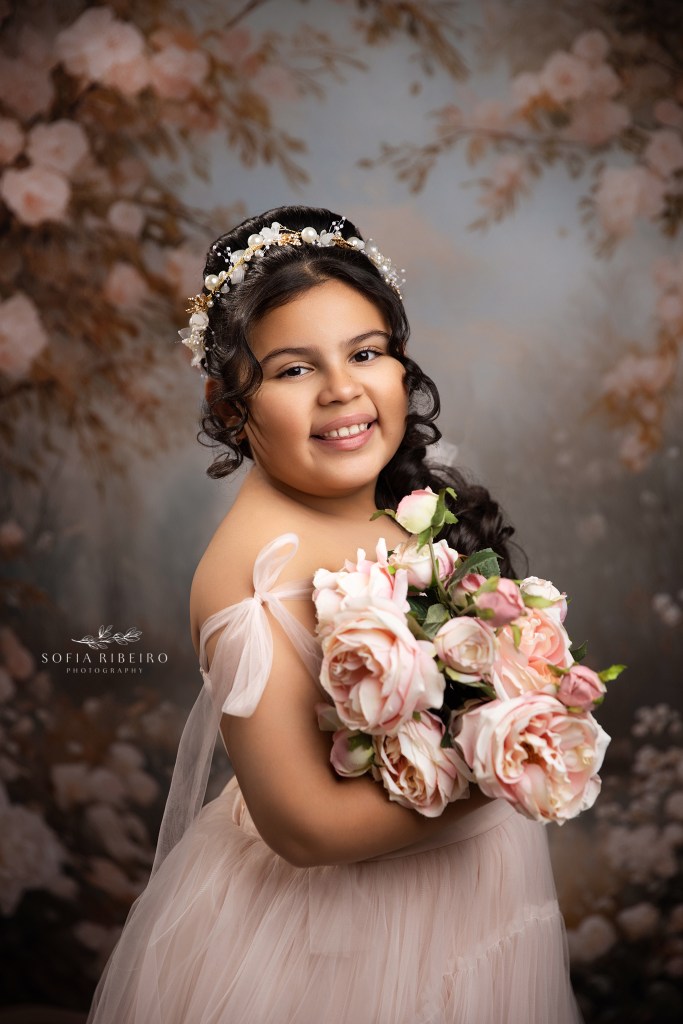 a portrait of a young girl against a floral backdrop, alternate communion portraits
