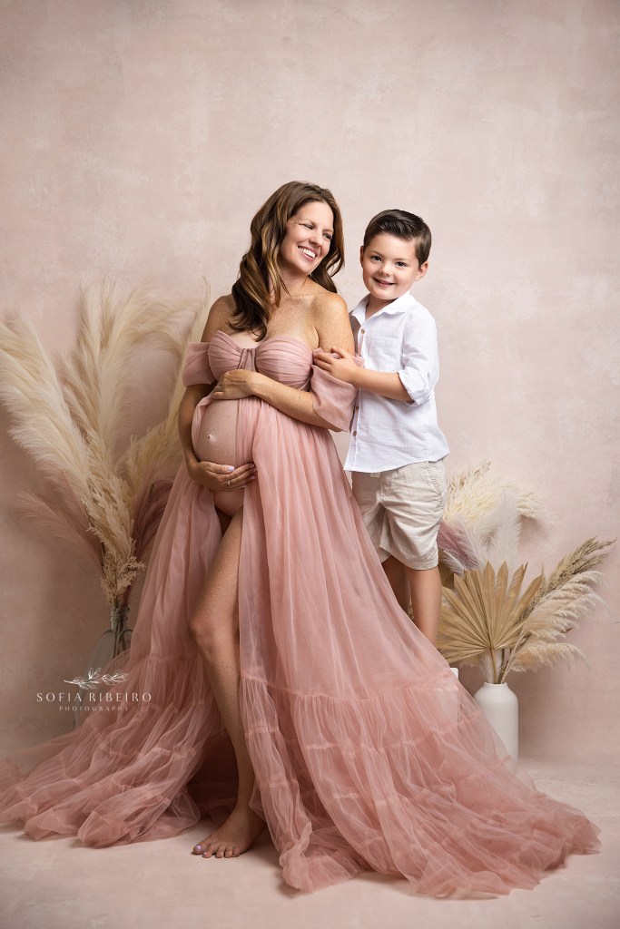a moment for her older son during her maternity photography session in nj