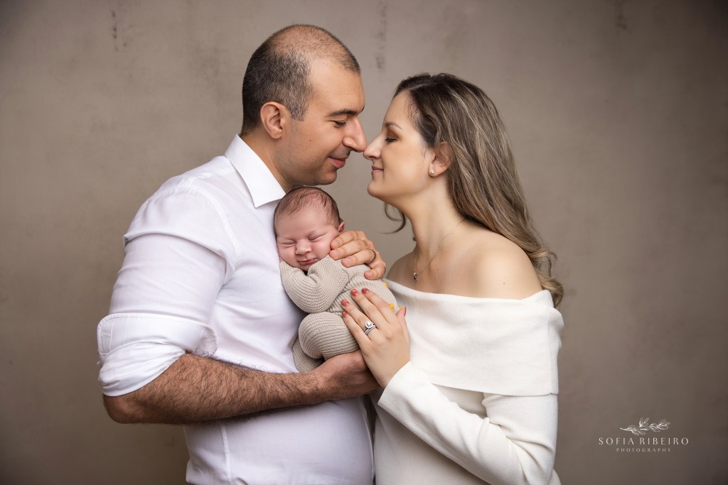 nj newborn photographer captures baby with parents in first photos together as a family