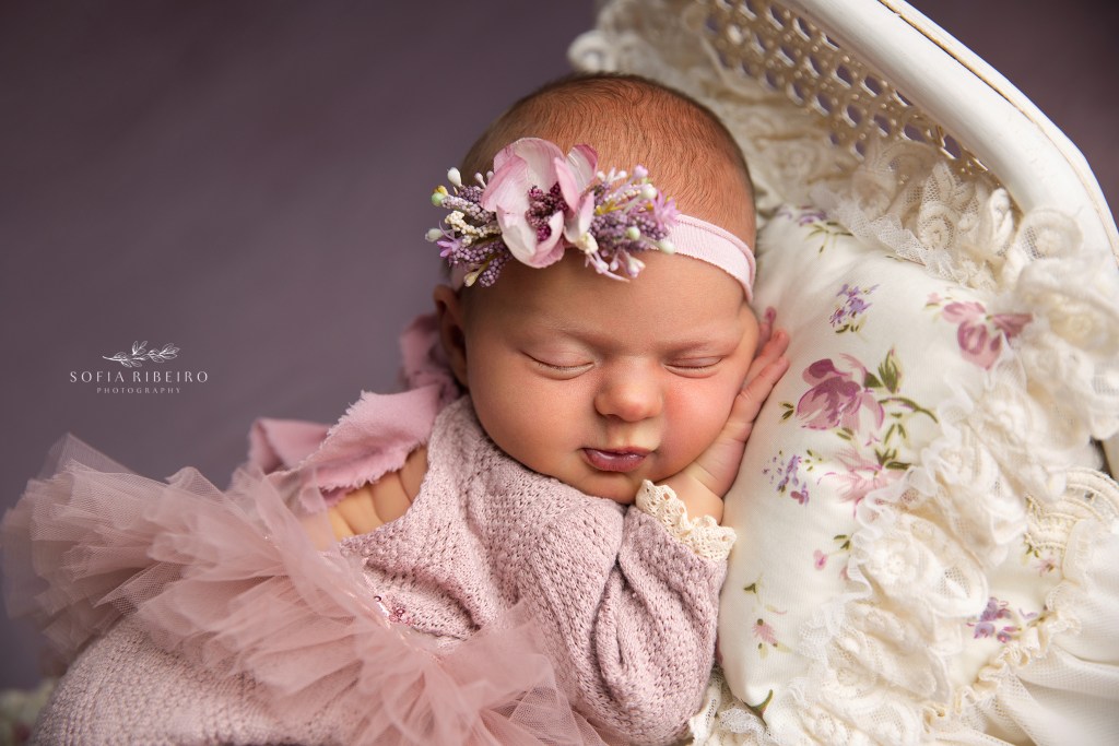 a closeup of baby's smirk during a nj newborn photo session