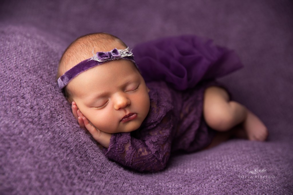 deep purple tones for a baby girl's newborn photos