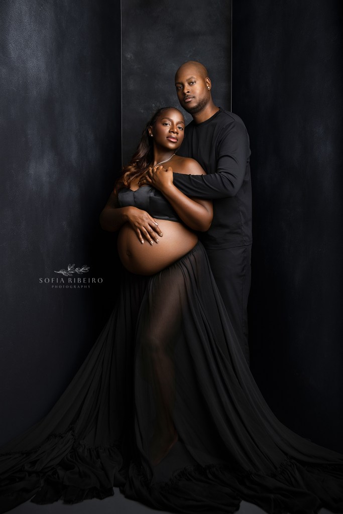 mom and dad to be create an elevated portrait with a nj maternity photographer