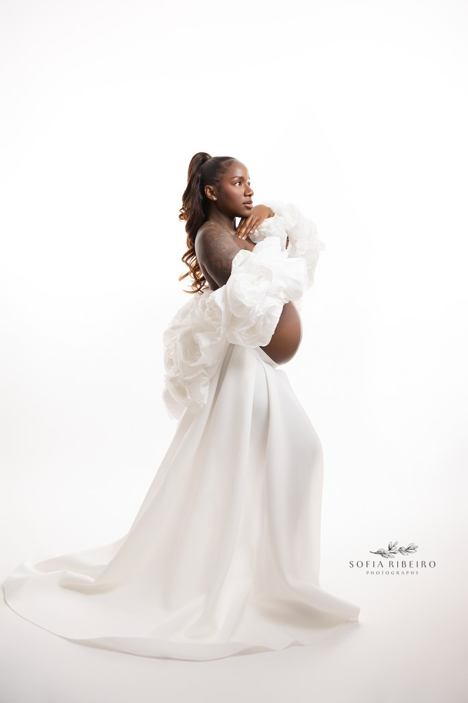 nj maternity photographer creates bold, high end images. Mom all in white with backlighting